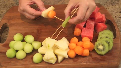 Making Fresh Fruit Kebabs Stock Footage 61200573
