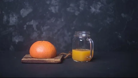 Making fresh grapefruit juice stop motion Stock Footage 127265757