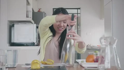 Making Fresh Lemonade: A Joyful Kitchen Experience Stock Footage 313918429