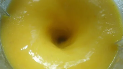 Making fresh mango fruit shake in blender. The concept of a healthy lifestyle 스톡 동영상 127704438