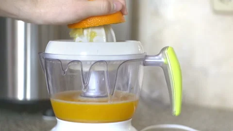 Making a fresh Orange Juice Stock Footage 234795703
