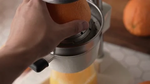 Making fresh orange juice with squeezer Stock Footage 158333557