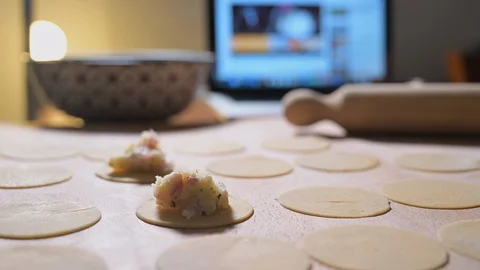 Making fresh pasta by watching a tutorial on the Internet 스톡 동영상 128397700