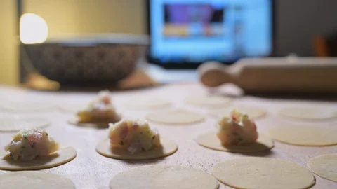 Making fresh pasta by watching a tutorial on the Internet Stock Footage 128451393