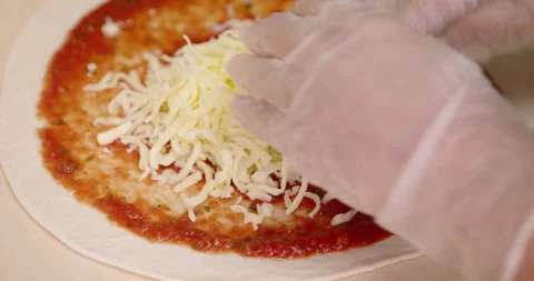 Making fresh pizza the cheese topping 스톡 동영상 200775437