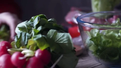 Making fresh salad Stock Footage 81176712
