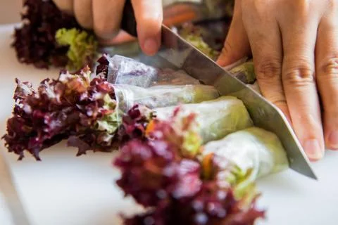 Making fresh vegetable salad roll, healthy meal for diet Stock Photos