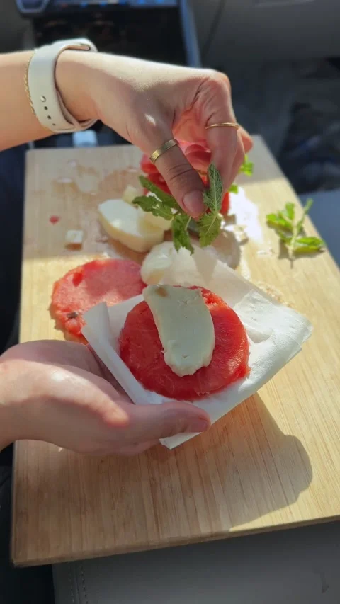 Making Fresh Watermelon Cheese Sandwich In Car Stock Footage 337385870