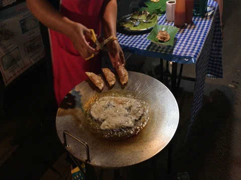 Making fried dumplings at open air market Stock Footage 79191375