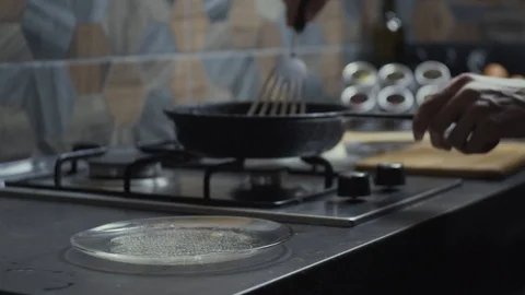 Making fried eggs Stock Footage 125948797