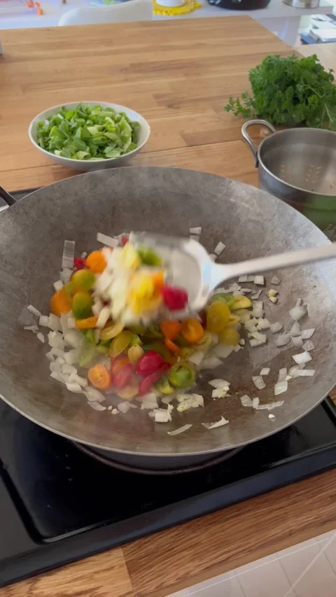 Making fried rice with cherry tomatoes Stock Footage 219286266