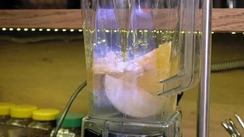 Making a fruit cocktail in a blender Video stock 105985939
