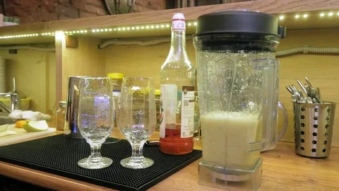 Making a fruit cocktail in a blender Stock Footage 105988895