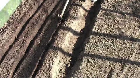 Making a furrow Stock Footage 24696066