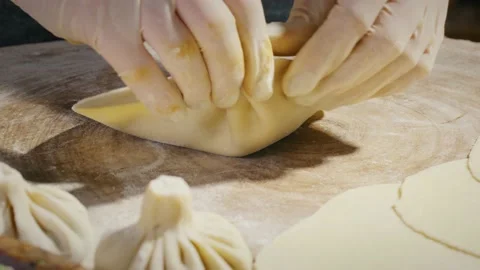 Making Georgian Khinkali with hands Stock Footage 138127035