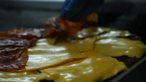 Making of a giant bacon cheeseburger Stock Footage 260078737