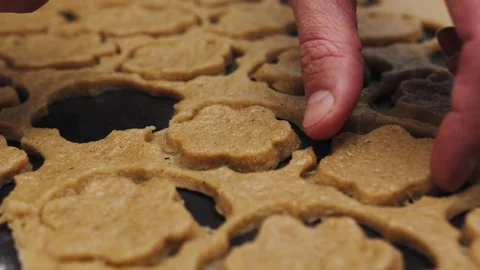 Making ginger cookies for Holidays, form for cutting gingerbread, Merry Stock Footage 233816071