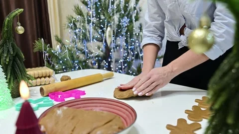 Making gingerbread flatbread for Christmas with beautiful girl's hands Stock Footage 345572794