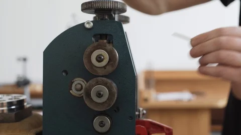Making a gold ring. Broaching the blank for the ring. Stock Footage 105259298