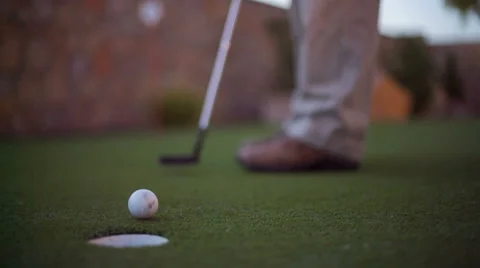 Making Golf Putt on Practice Green Stock Footage 60216011
