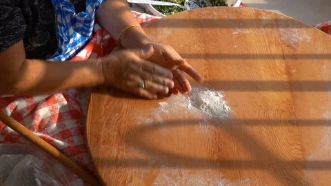 Making gozleme, organic spinach bread with a mother in kitchen. Stock Footage 122438734