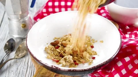 Making granola flakes breakfast Stock Footage 169587328