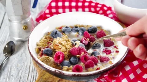 Making granola flakes breakfast Stock Footage 169587367