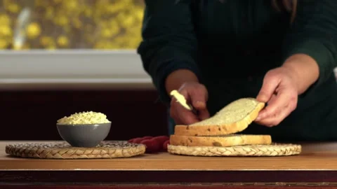 Making a grated cheese and tomato sandwich 스톡 동영상 273590566