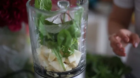 Making a green smoothie!  Stock Footage 109547101