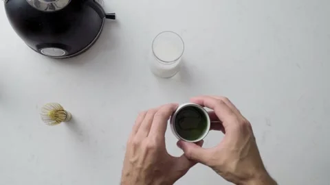 Making green tea matcha with milk. Top view. Stock-Footage 160041046