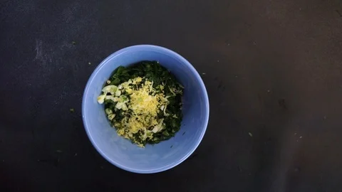 Making gremolata overhead Stock Footage 120462343