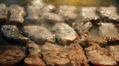 Making of grilled beef  steak on hot plate with smoke Video stock 61554417