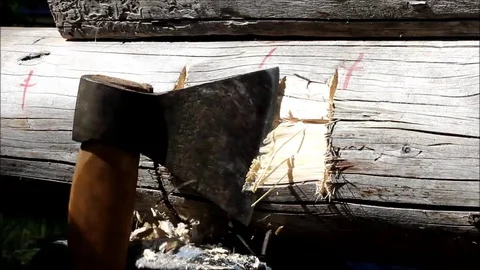 Making a groove in the beam for fixing the lag, to which the floor is planned Stock Footage 77364890