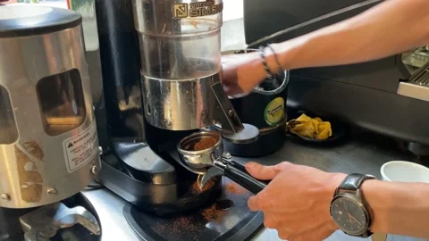 Making Ground Coffee With Coffee Grinder. Stock Footage 231368650