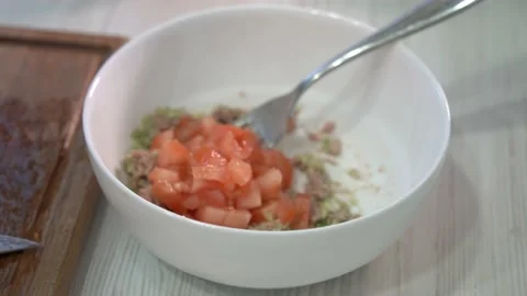 Making guacamole in the kitchen Stock Footage 232131634