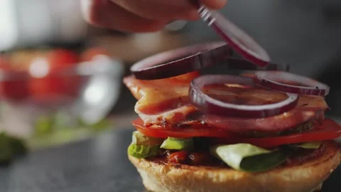 Making Hamburger with Fresh Ingredients and Bacon on a Kitchen Counter Stock Footage 331101265