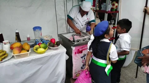 Making handmade ice cream rolls at a festival in San Ramon, Peru (PART ONE) 스톡 동영상 284889496