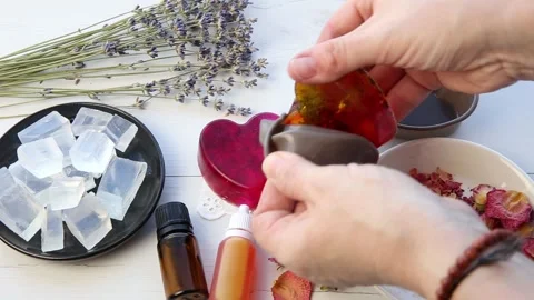 Making handmade soap with crystal clear melt and pour soap mixture. Stock-Footage 148750631