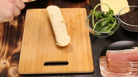 Making a healthy sandwich at the kitchen Stock Footage 86232697