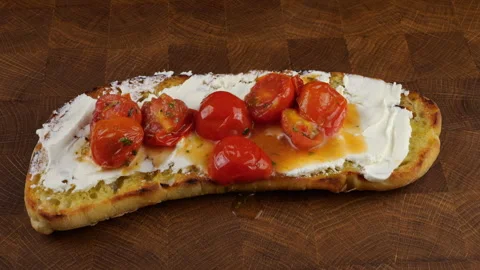 Making a healthy sandwich using a slice of homemade ciabatta bread 動画素材 319875487