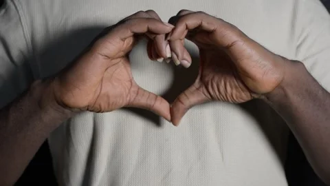 Making a heart gesture with hands Stock Footage 277435850