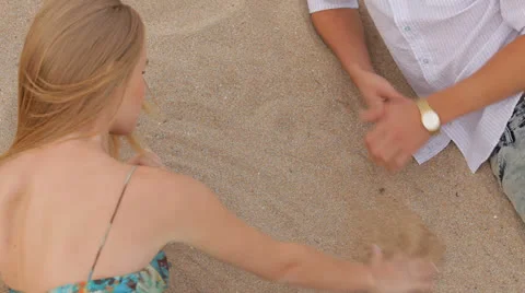 Making Heart On The Sand. Time lapse Stock-Footage 26176011