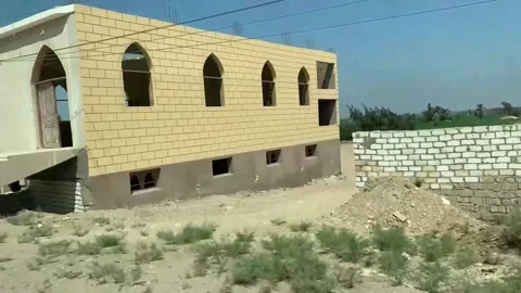 Making his last wish come true: building an outpatient clinic for thousands of p Stock Footage 313431338