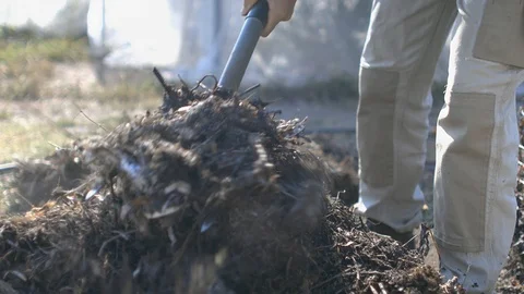 Making home compost close up of compost on fork Stock Footage 108134990