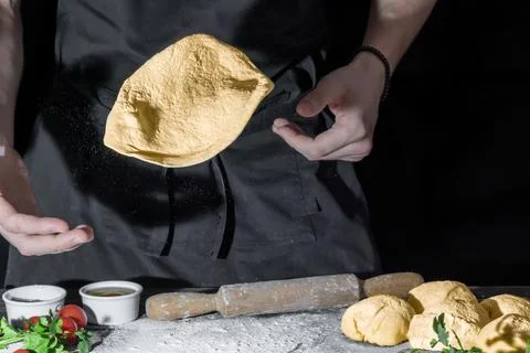 Making homemade bread. Step-by-step instruction. The cook shapes the dough Fotos de archivo