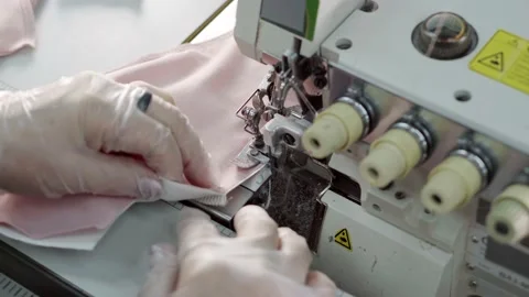 The making a homemade face masks on a sewing machine, close up. Stock Footage 144680653