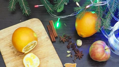 Making hot alcohol, cook mulled wine orange, apples and spices. drink in winter 動画素材 220549461