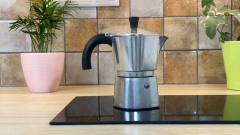 Making hot coffee in the mocha pot Stock Footage 125485765