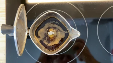 Making hot coffee in the mocha pot Stock Footage 125485796