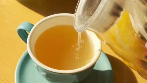 Making hot lemon tea with honey, autumn winter comfort drink, seasonal well.. Stock Footage 344955808